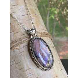 This Labradorite purple fire pendant sterling silver by Earth Karma is made with love by EARTH KARMA! Shop more unique gift ideas today with Spots Initiatives, the best way to support creators.