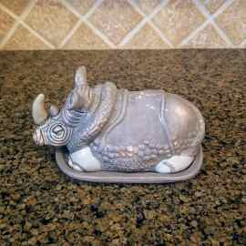This Rhino Butter Dish Ceramic Blue Sky Heather Goldminc is made with love by Premier Homegoods! Shop more unique gift ideas today with Spots Initiatives, the best way to support creators.