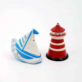 This Salt and Pepper Set of a Sailboat & Light House Collectible Decorative is made with love by Premier Homegoods! Shop more unique gift ideas today with Spots Initiatives, the best way to support creators.
