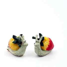This Salt and Pepper Set of Strawberry Snail Collectible Décor is made with love by Premier Homegoods! Shop more unique gift ideas today with Spots Initiatives, the best way to support creators.