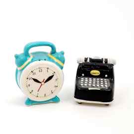 This Salt and Pepper Set of a Typewriter & Clock Collectible Decorative is made with love by Premier Homegoods! Shop more unique gift ideas today with Spots Initiatives, the best way to support creators.
