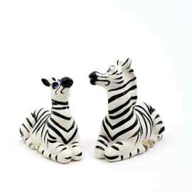This Salt and Pepper Set of Zebras Collectible Decorative is made with love by Premier Homegoods! Shop more unique gift ideas today with Spots Initiatives, the best way to support creators.