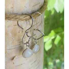 This Moonstone earrings with dangle hearts by Earth Karma is made with love by EARTH KARMA! Shop more unique gift ideas today with Spots Initiatives, the best way to support creators.