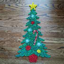 This Vintage Christmas Melted Plastic Popcorn Holiday Tree Hanging Wall Decor is made with love by Premier Homegoods! Shop more unique gift ideas today with Spots Initiatives, the best way to support creators.