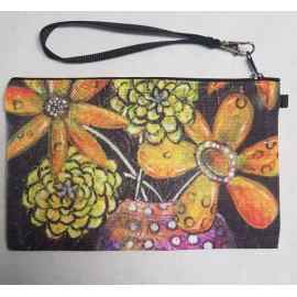 This Wristlet "Orange Appeal" is made with love by Studio Patty D! Shop more unique gift ideas today with Spots Initiatives, the best way to support creators.