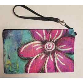 This Wristlet "Pink-a-Boo" is made with love by Studio Patty D! Shop more unique gift ideas today with Spots Initiatives, the best way to support creators.