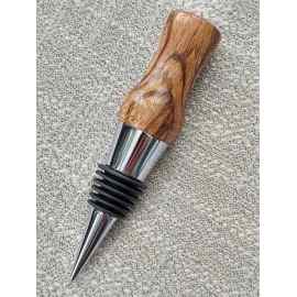 This Zebrawood Bottle Stopper is made with love by Blackbear Designs! Shop more unique gift ideas today with Spots Initiatives, the best way to support creators.