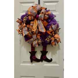 This Purple Halloween Witch wreath with legs is made with love by Willow Chic Designs! Shop more unique gift ideas today with Spots Initiatives, the best way to support creators.