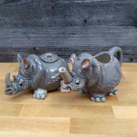 This Rhino Sugar Bowl and Creamer Set Decorative by Blue Sky is made with love by Premier Homegoods! Shop more unique gift ideas today with Spots Initiatives, the best way to support creators.