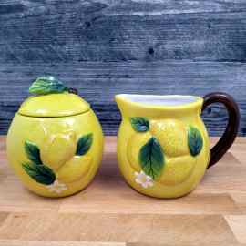 This Summer Cottage Lemon Sugar Bowl and Creamer Set Decorative by Blue Sky is made with love by Premier Homegoods! Shop more unique gift ideas today with Spots Initiatives, the best way to support creators.
