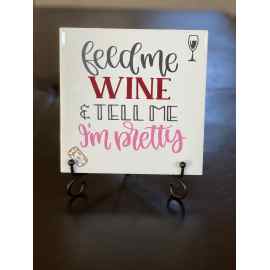 This Feed Me Wine and Tell Me I’m Pretty Ceramic Tile Sign with Easel is made with love by Anything Goes (with grey) Creations! Shop more unique gift ideas today with Spots Initiatives, the best way to support creators.