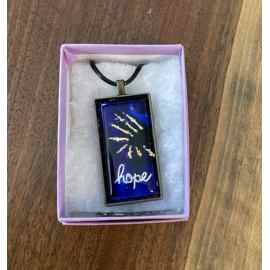 This Pendant, necklace, hope, blue, gold is made with love by Designs by Starla! Shop more unique gift ideas today with Spots Initiatives, the best way to support creators.
