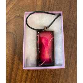 This Pendant, necklace, red, pink, gold, hand painted with Alcohol ink is made with love by Designs by Starla! Shop more unique gift ideas today with Spots Initiatives, the best way to support creators.