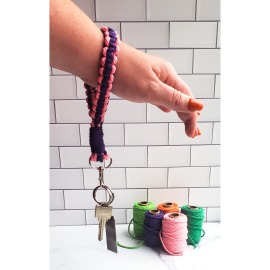 This Boho Macrame Keychain Wristlet is made with love by 3ChickswithSticks! Shop more unique gift ideas today with Spots Initiatives, the best way to support creators.