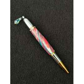 This Red & Aqua Swirl Diva Charm Pen is made with love by Blackbear Designs! Shop more unique gift ideas today with Spots Initiatives, the best way to support creators.