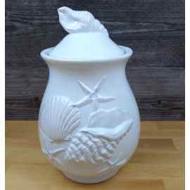 This Laguna Coastal Shell Canister 9" Blue Decorative Sea Life Jug by Blue Sky is made with love by Premier Homegoods! Shop more unique gift ideas today with Spots Initiatives, the best way to support creators.