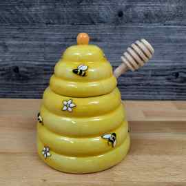 This Bee Hive Honey Pot Canister Ceramic With Wood Dipper Stick By Blue Sky is made with love by Premier Homegoods! Shop more unique gift ideas today with Spots Initiatives, the best way to support creators.