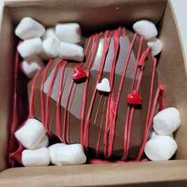 This Chocolate breakable heart is made with love by What A Delightful Treat! Shop more unique gift ideas today with Spots Initiatives, the best way to support creators.