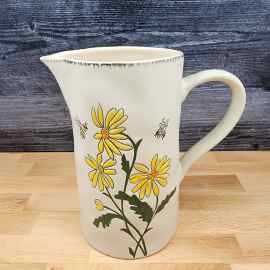 This Daisies and Bee's Summer Embossed Pitcher Decorative Floral Home by Blue Sky is made with love by Premier Homegoods! Shop more unique gift ideas today with Spots Initiatives, the best way to support creators.