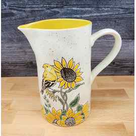 This Sunflower and Yellow Bird Embossed Pitcher Decorative Floral Home by Blue Sky is made with love by Premier Homegoods! Shop more unique gift ideas today with Spots Initiatives, the best way to support creators.