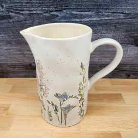 This Garden Spring Flowers Embossed Pitcher Decorative Floral Home by Blue Sky is made with love by Premier Homegoods! Shop more unique gift ideas today with Spots Initiatives, the best way to support creators.