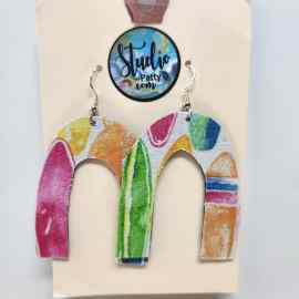 This Fishhook Pierced Earrings - colorful arches is made with love by Studio Patty D! Shop more unique gift ideas today with Spots Initiatives, the best way to support creators.