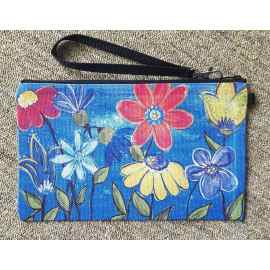 This Happy Floral Wristlet is made with love by Studio Patty D! Shop more unique gift ideas today with Spots Initiatives, the best way to support creators.