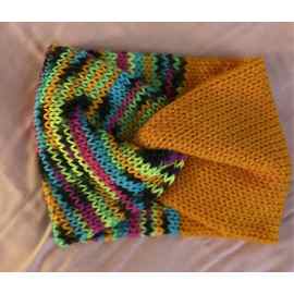This Double Knit Twisted Headband/Ear Warmer - Orange/Colorful Stripes is made with love by Classy Crafty Wife! Shop more unique gift ideas today with Spots Initiatives, the best way to support creators.