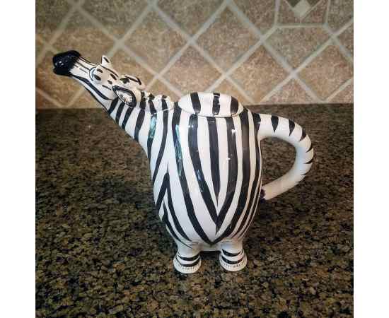 https://spotsonthefox.com/images/thumbnails/550/450/detailed/4/zebra-ceramic-teapot-decorative-kitchen-decor-new-blue-sky-by-lynda-corneille-spots-initiatives-2664.jpg